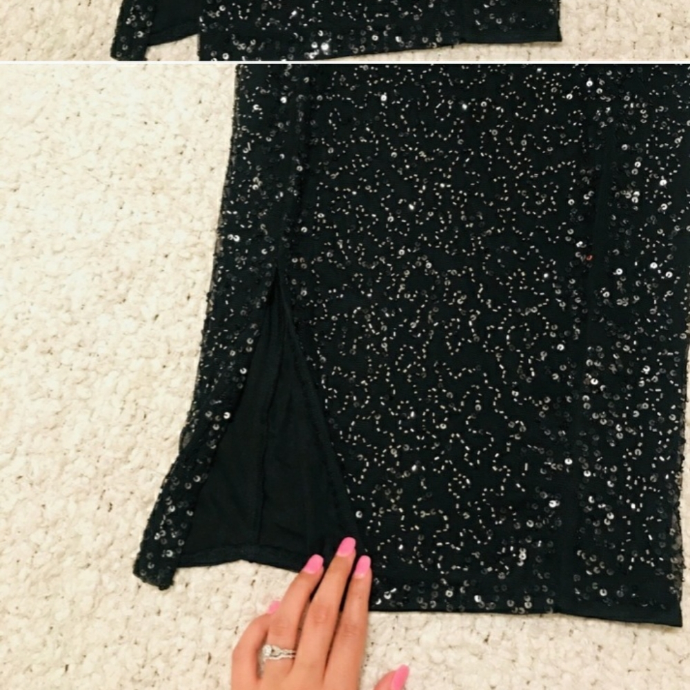 Black pencil skirt with opened front.